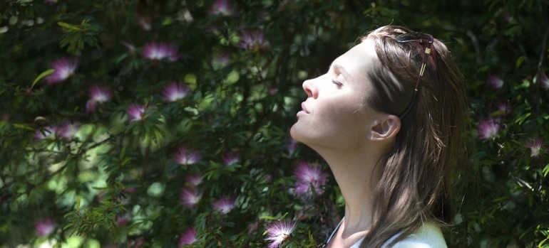 Person taking a break in nature to breathe