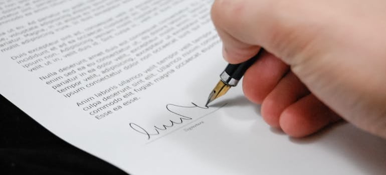 Person signing a document