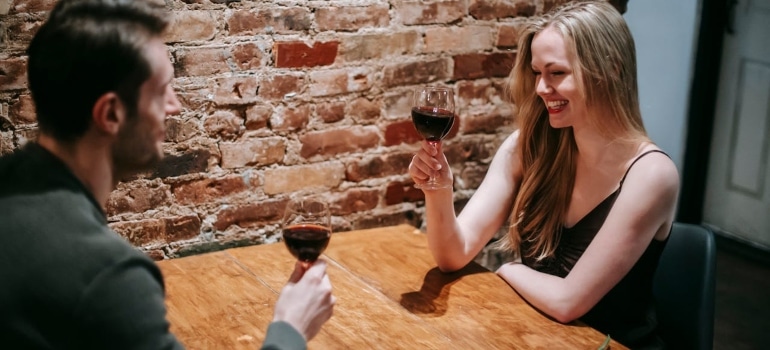 a couple drinking wine 