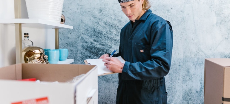 a man packing looking at some charts 